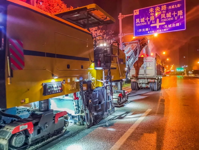 让球网铣刨机械团助力全运会城市道路建设